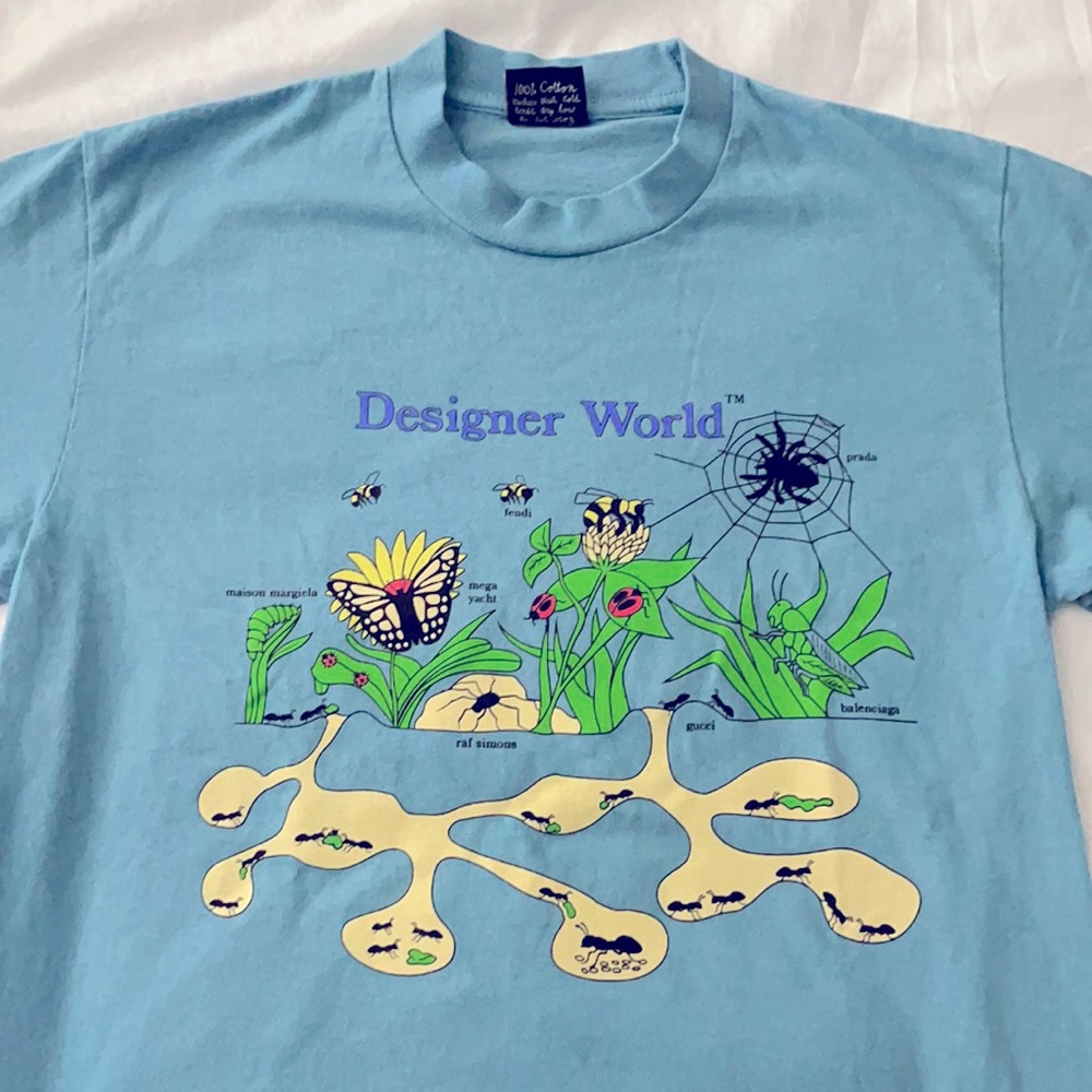 MEGA YACHT DESIGNER WORLD T SHIRT. NEVER WORN